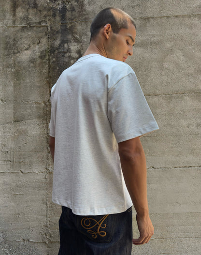 Maglia in 100% cotone con logo ricamato