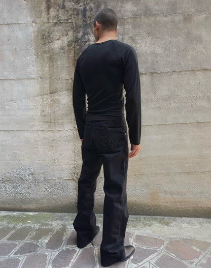 Jeans “Fusion Bootcut” in raw denim originale cimosato, ricamo e bottoni e rivetti in ottone logati