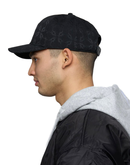 Cappello in tessuto ATIER con ricami e chiusura in vera pelle tamburellata