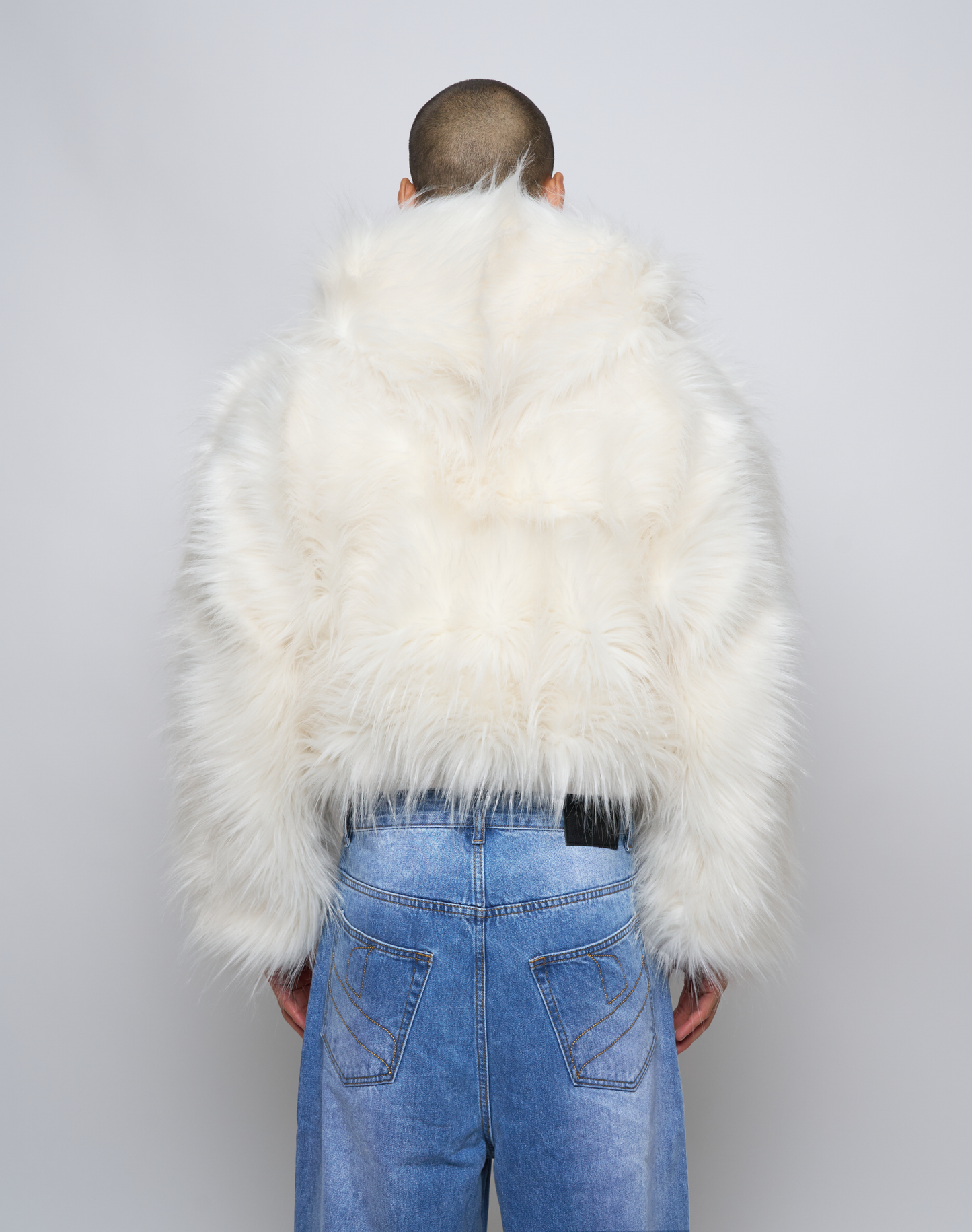 Pelliccia Sintetica con cappuccio oversize foderata in seta