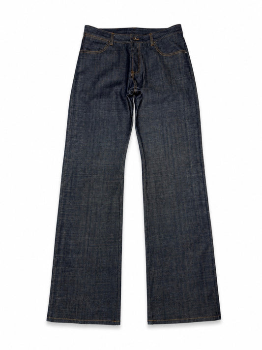 Jeans “Fusion Bootcut” in raw denim originale cimosato, ricamo e bottoni e rivetti in ottone logati
