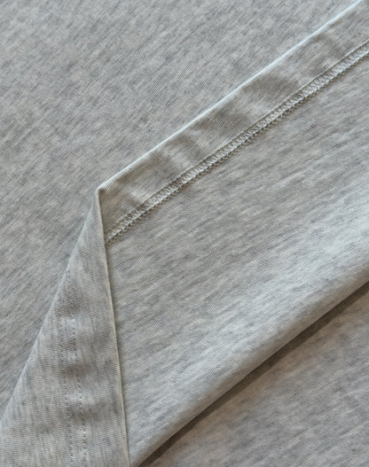 Maglia in 100% cotone con logo ricamato