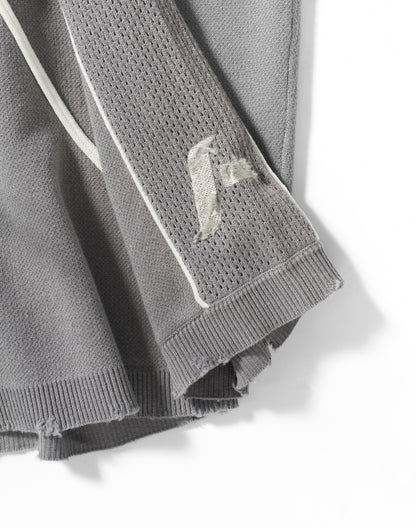 Maglia "Soccer" jacquard con ricami destroyed