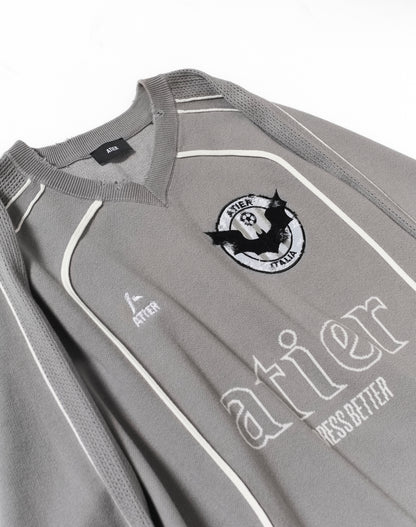 Maglia "Soccer" jacquard con ricami destroyed